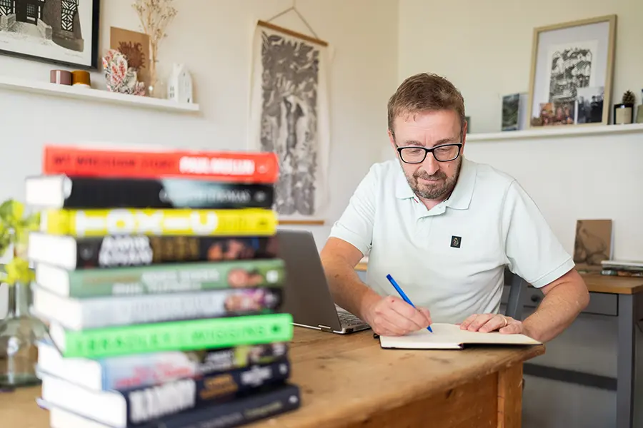 UK Ghost writer John Woodhouse makes some notes